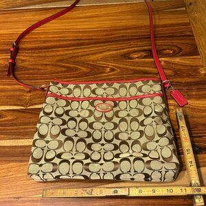 Coach Signature Crossbody bag with red leather accents